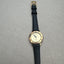 Designer Gucci Black Leather and Gold Roman Numeral