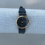Pristine Gold and Black Snake Skin Leather Diamond Watch