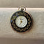 Swiss Made Ornate Pocket Watch β Black & Gold Embellished Face with Floral Scroll Back