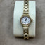 Women's Bulova Gold Watch with White Face – Elegant Simplicity