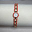 1990's Avon, Gold and Deep Peach Tone, Round Dainty Watchm039