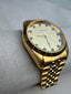 Distinctive Luxury Men's Gold Watch with Blue Stone Pips