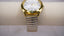 Vintage XAPWV Quartz Gold-Tone Watch | White Dial & Silver Expansion Band | Classic Everyday Style