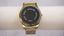 Vintage XAPWV Quartz Gold-Tone Watch | White Dial & Silver Expansion Band | Classic Everyday Style