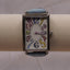 Whimsical Multicolor Numbers Watch | Pastel Blue Strap Retro Quartz Women’s Watch | Fun Artistic Statement Timepiece font
