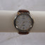 Sleek Men's Neutral Gold and Brown Y2K Timex