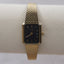 Vintage Bulova Women’s Gold Tank Watch with Black Dial | 1970s Bulova Quartz | Gold Mesh Band | Elegant Retro Women’s Dress Watch