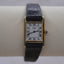 Vintage Seiko Tank-Style Quartz Watch – Roman Numerals, Gold-Tone Case, Black Leather Strap – Classic Minimalist