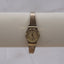 Vintage Helbros Gold-Tone Ladies Watch – Quartz – Small Dainty Oval Case – Retro 1980s Style – Working Condition