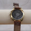 Vintage 1993 GUESS Dual-Time Traveler Watch – Gold & Leather